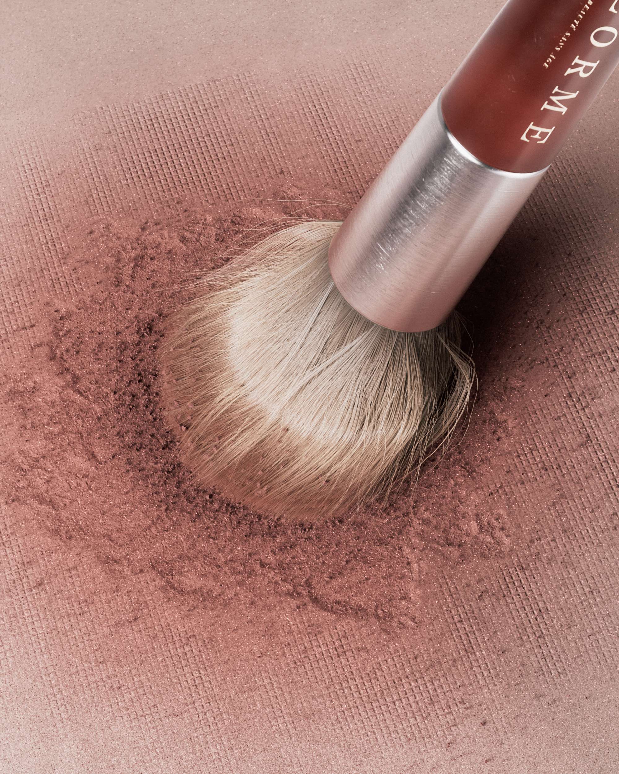 Pressed Pigment Series — Brown Edition compact in brown setting